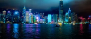 Hong Kong skyline at night with Victoria Harbour in the foreground