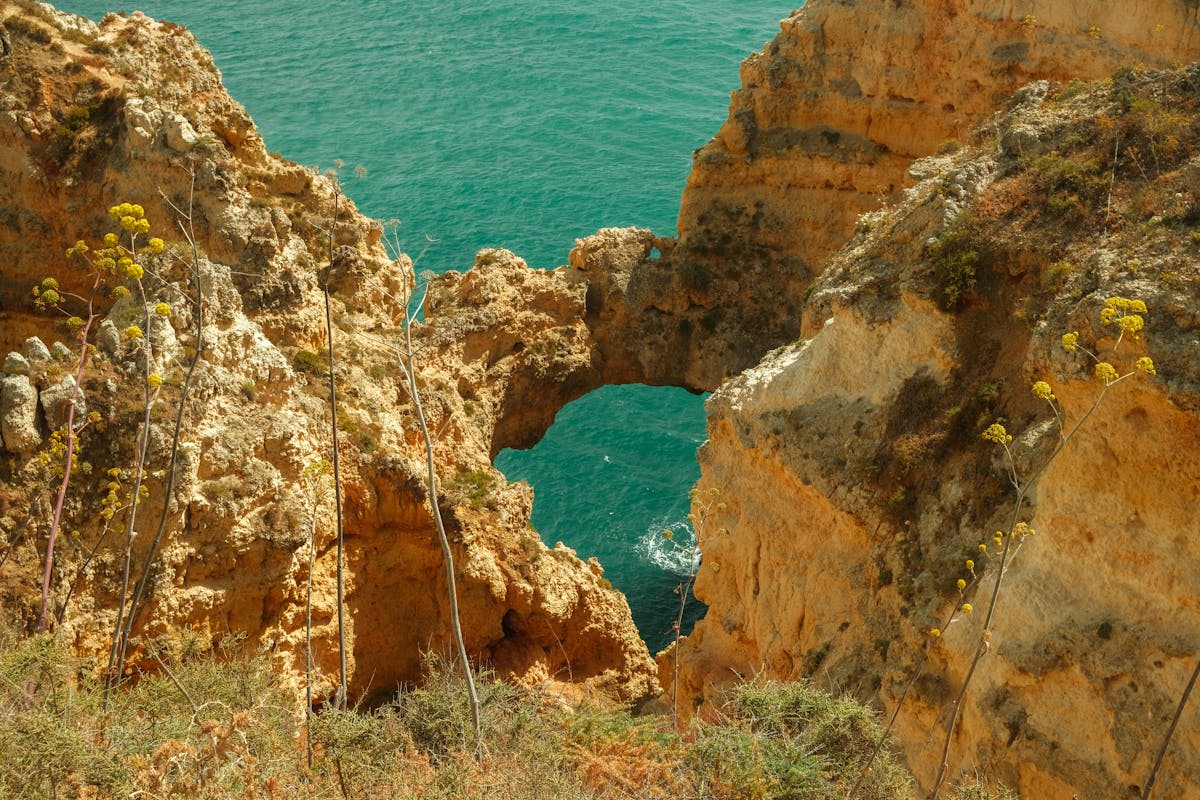Golden cliffs and a natural sea arch at Ponta da Piedade near Lagos in the Algarve