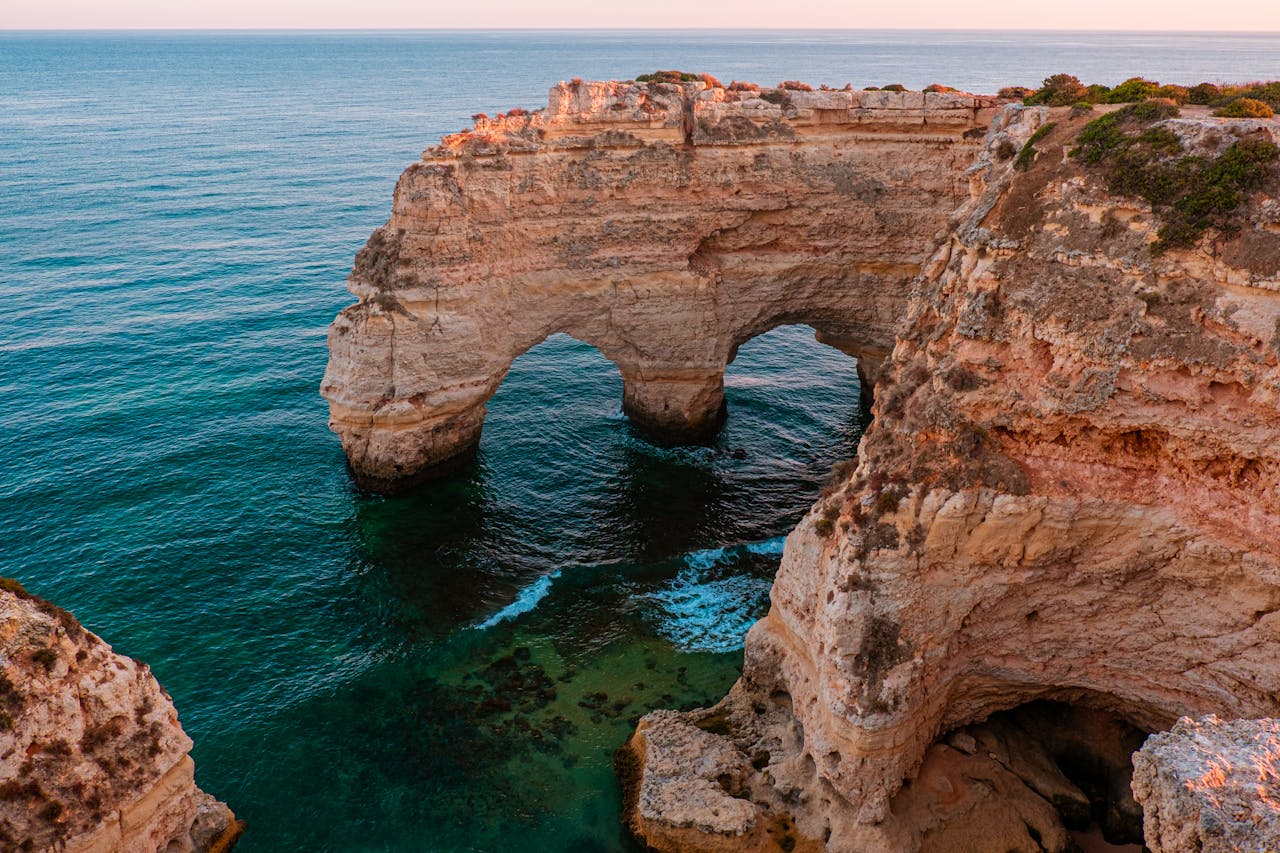 Scenic golden cliffs along the Algarve coast, Portugal