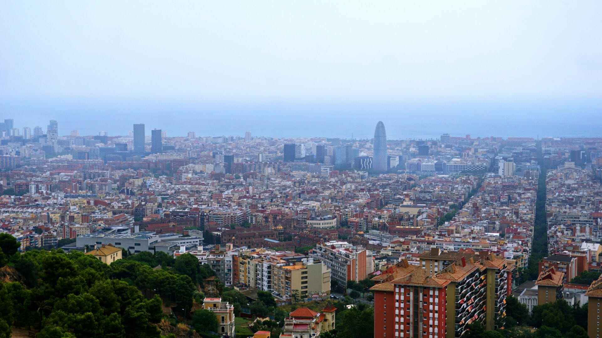 Barcelona city skyline with modern skyscrapers and Mediterranean coast
