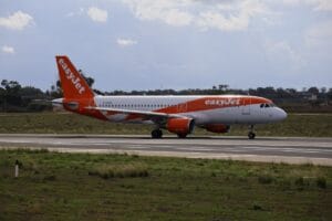 easyJet Airbus A320 aircraft on airport runway at a UK airport