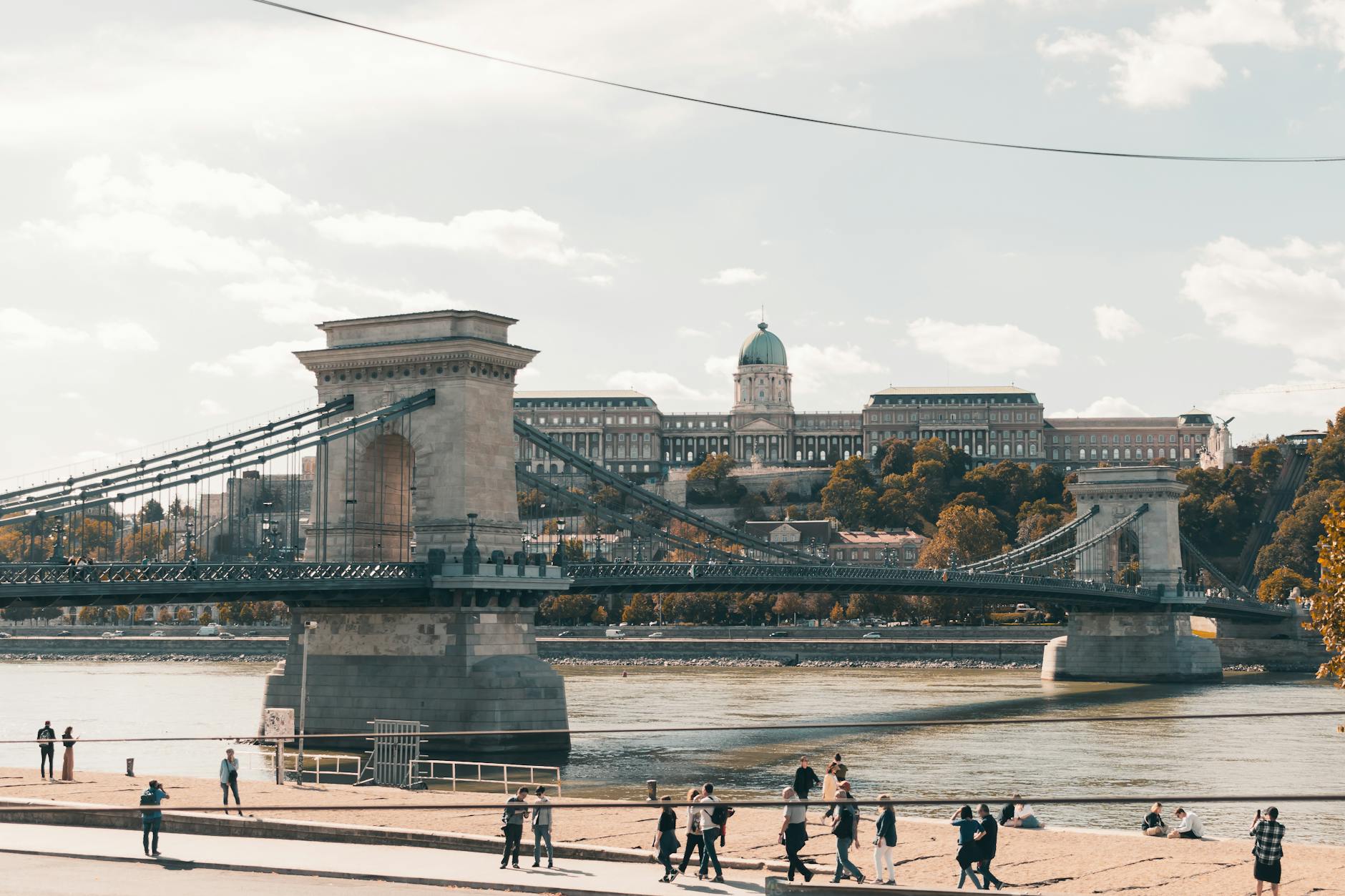 The Széchenyi Chain Bridge with Buda Castle behind it on the Danube in Budapest.