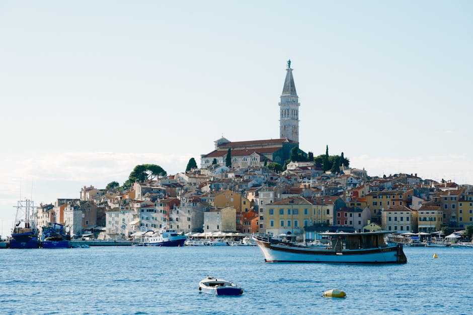 The colourful waterfront and church tower of Rovinj, a historic coastal town in Croatia's Istrian peninsula