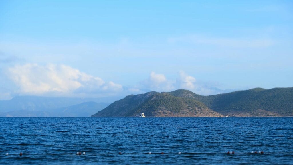 Dalaman coastline, Türkiye — turquoise water and pine-covered hills