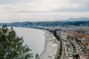 Stunning panoramic aerial view of Nice, showcasing the coastline and urban architecture.