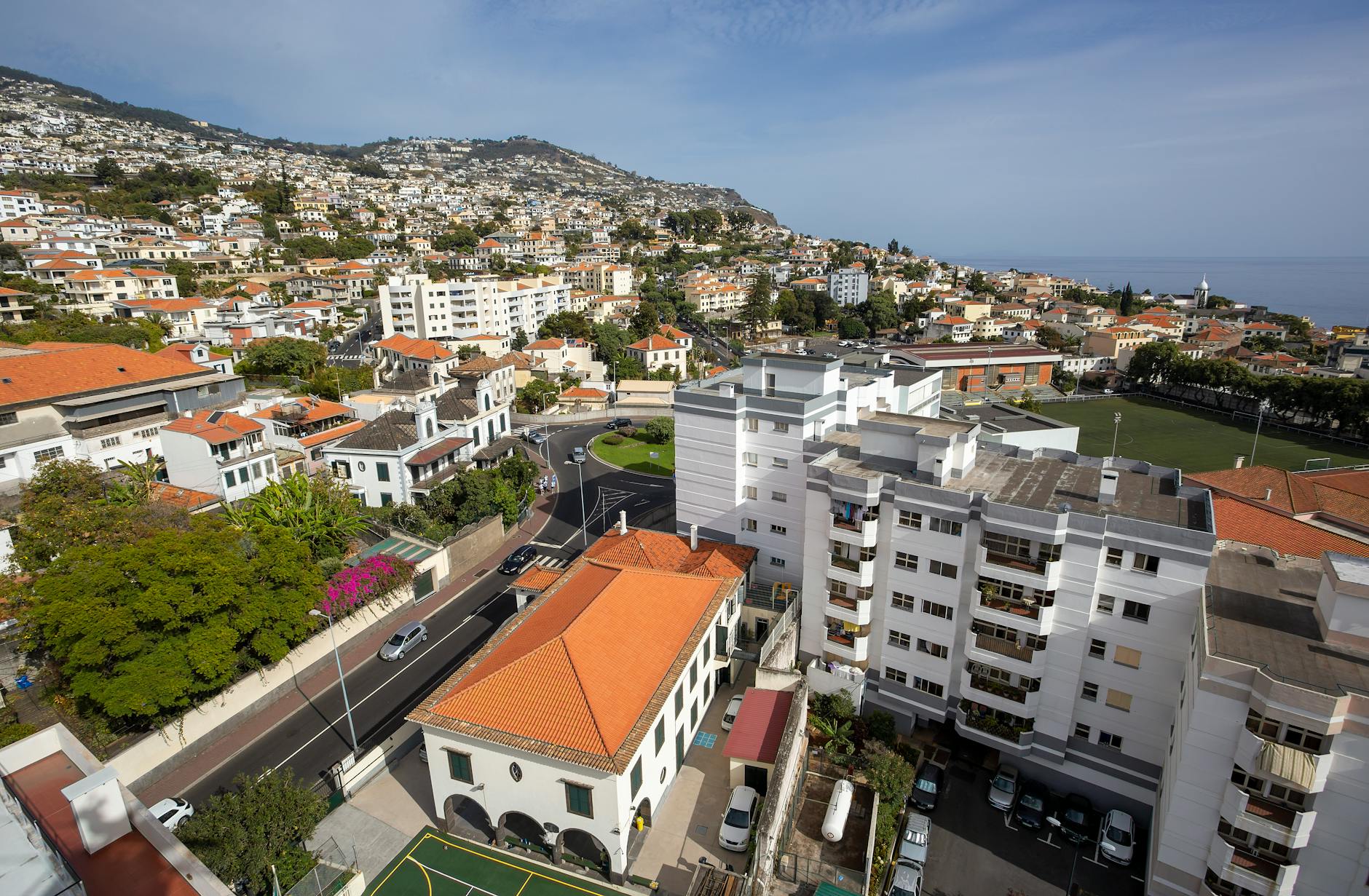 Aerial view of Funchal, Madeira showcasing red rooftops and the harbour