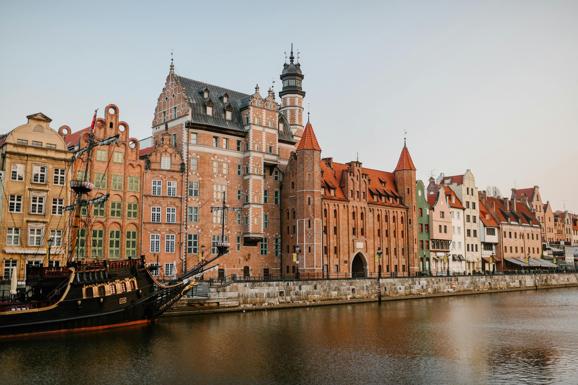 Colourful historic buildings lining the Motlawa River canal in Gdansk Poland