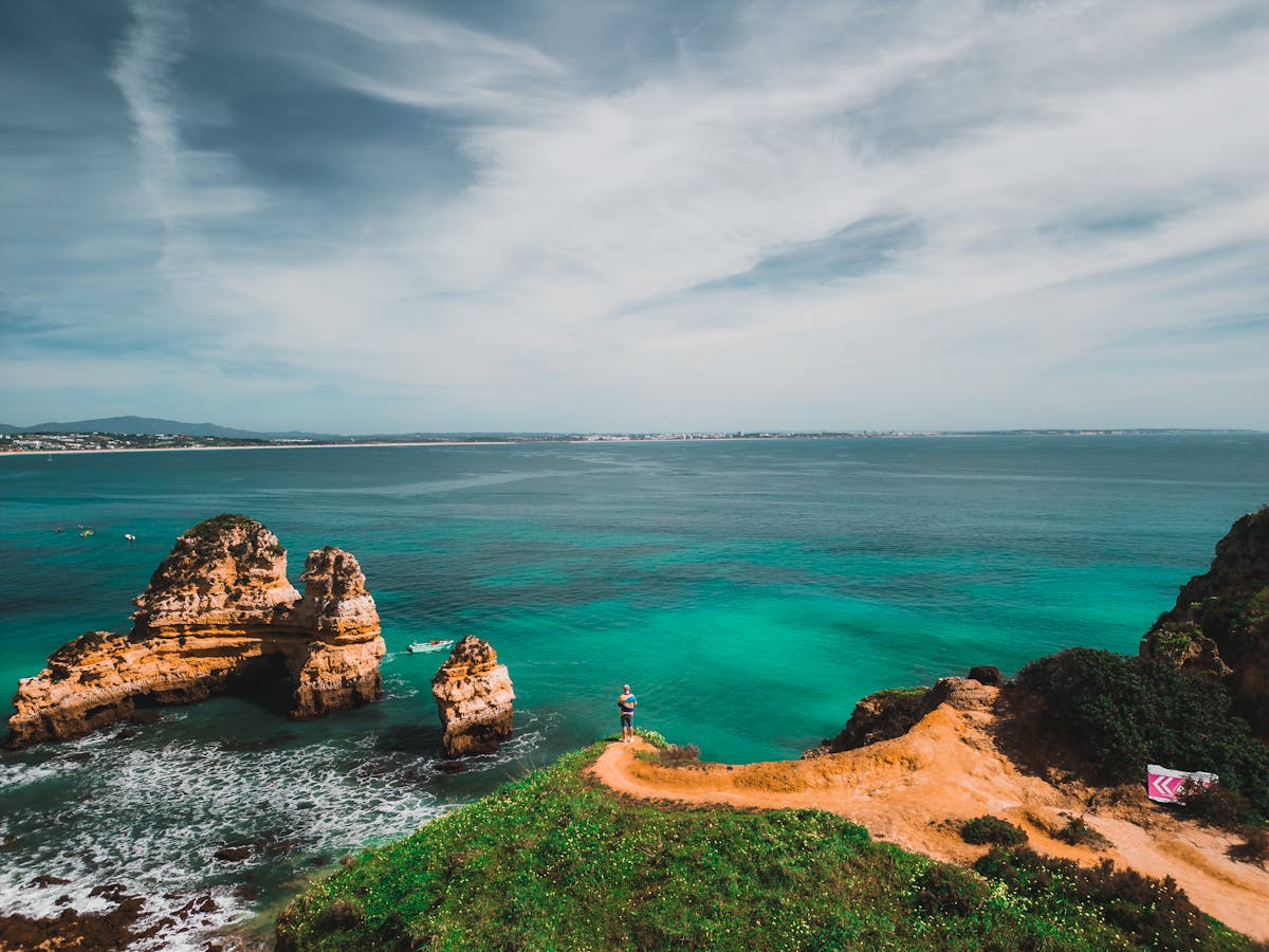 Aerial view of Lagos coastal cliffs and rock formations in the western Algarve, Portugal