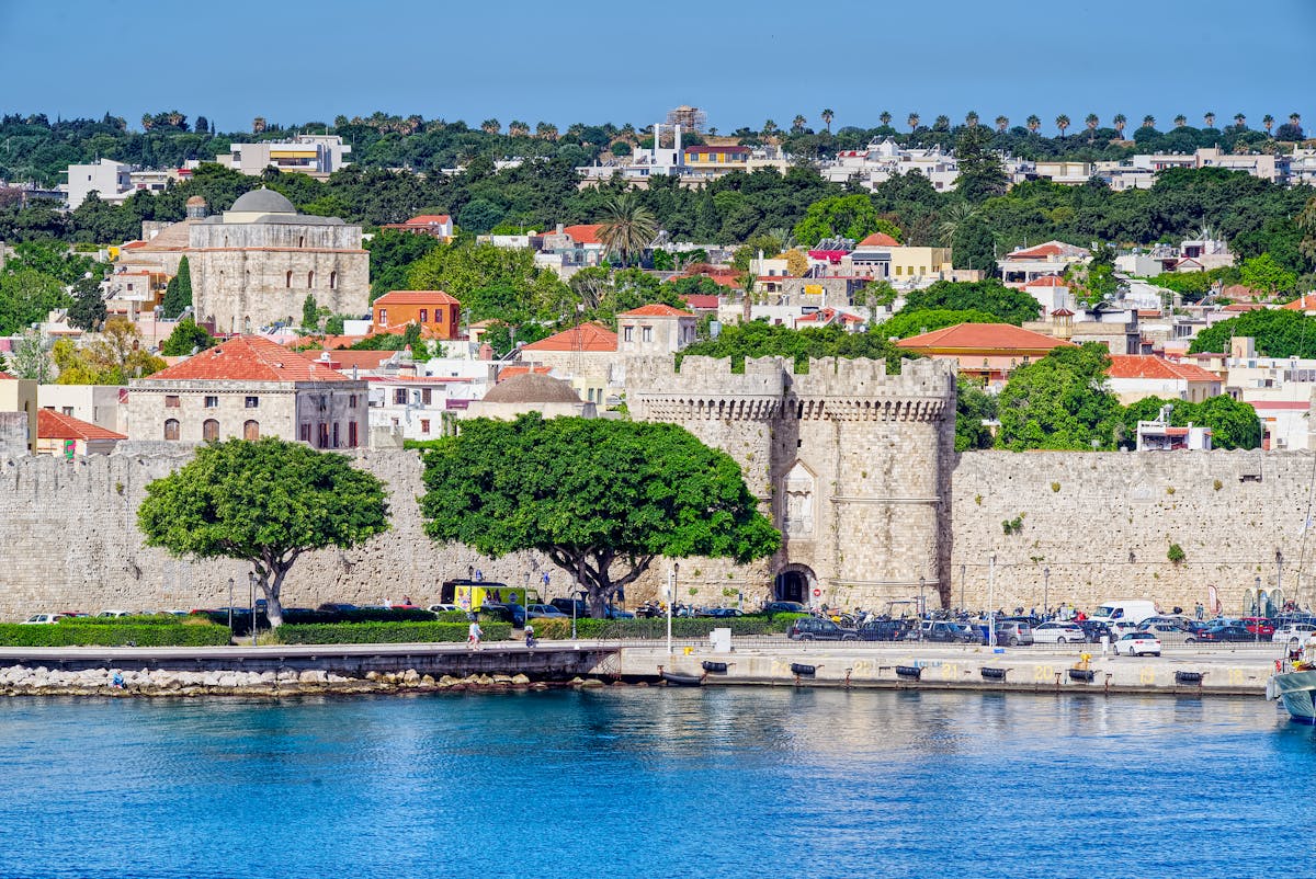 Beautiful medieval fortress in Rhodes, Greece, overlooking the turquoise sea