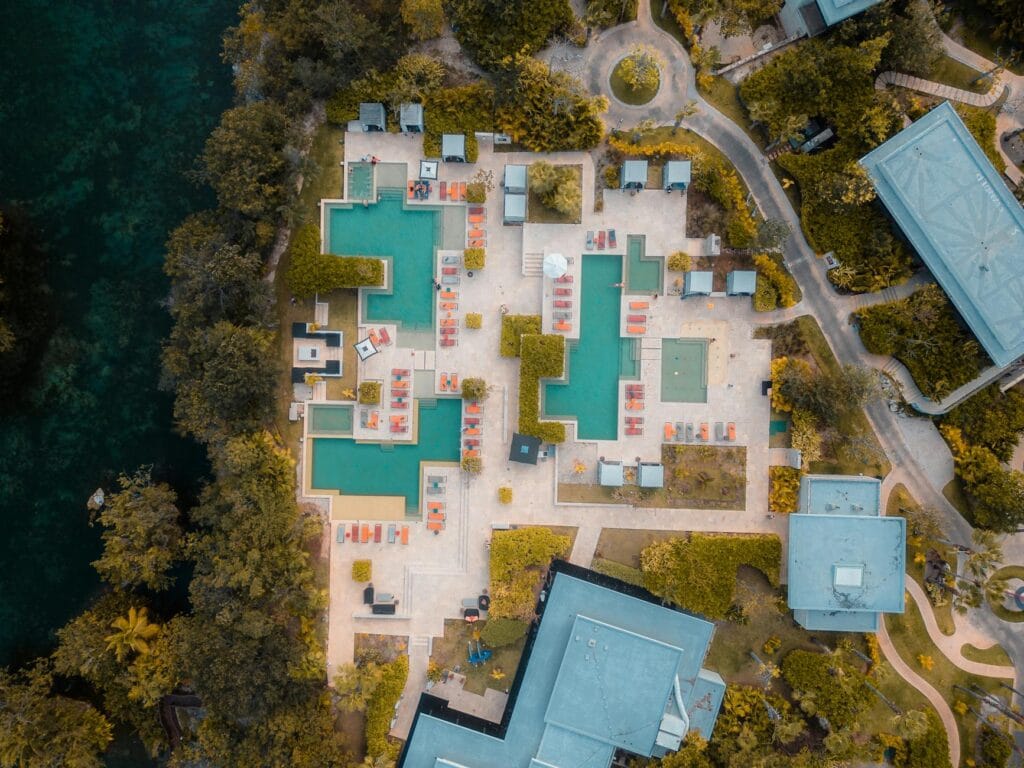 Aerial view of a luxury all-inclusive resort with multiple pools and sun terraces