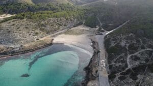 Aerial view of a Majorca beach landscape with turquoise Mediterranean water