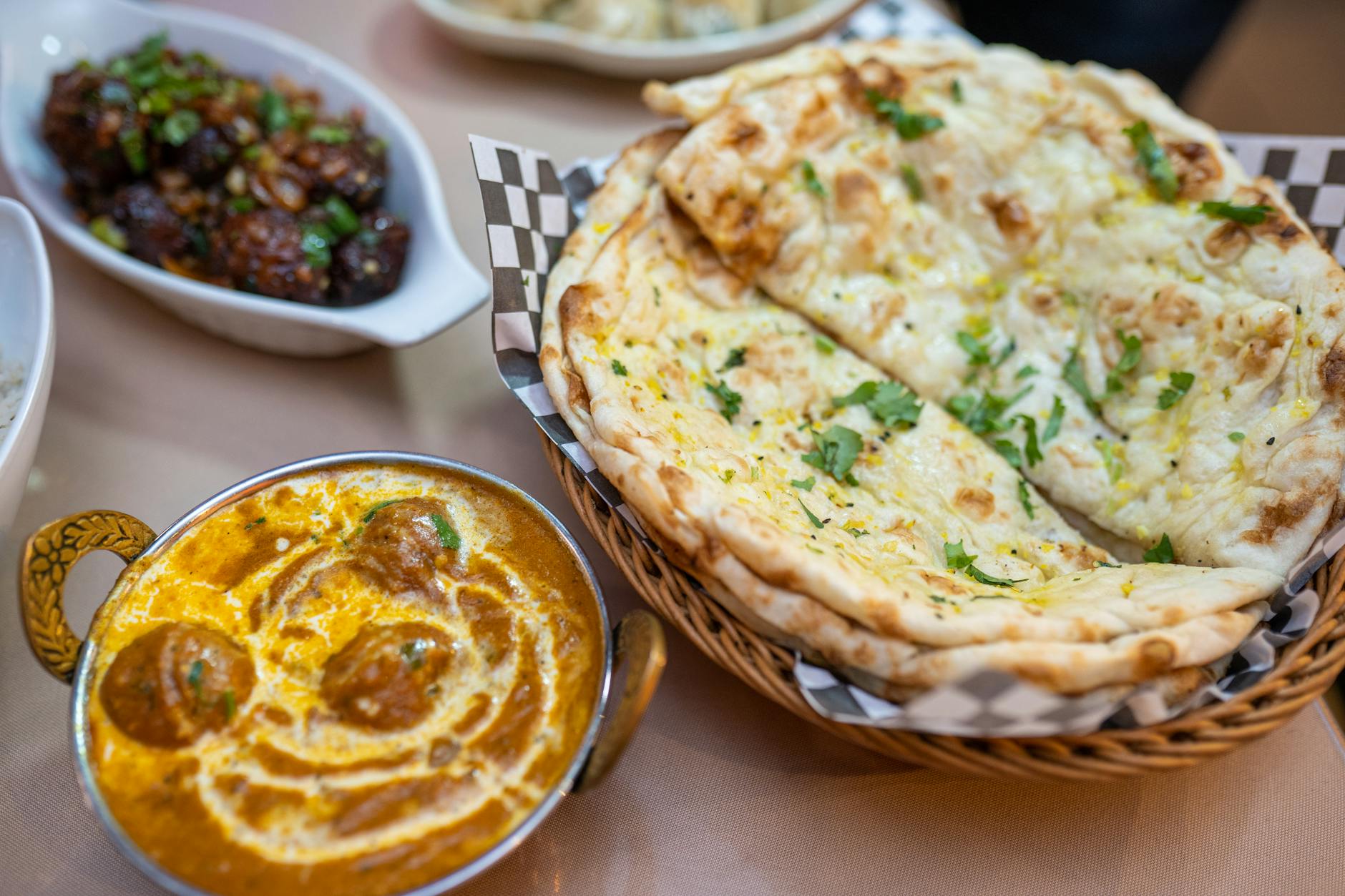 Curry and naan bread, the kind of meal found on Manchester's Curry Mile in Rusholme