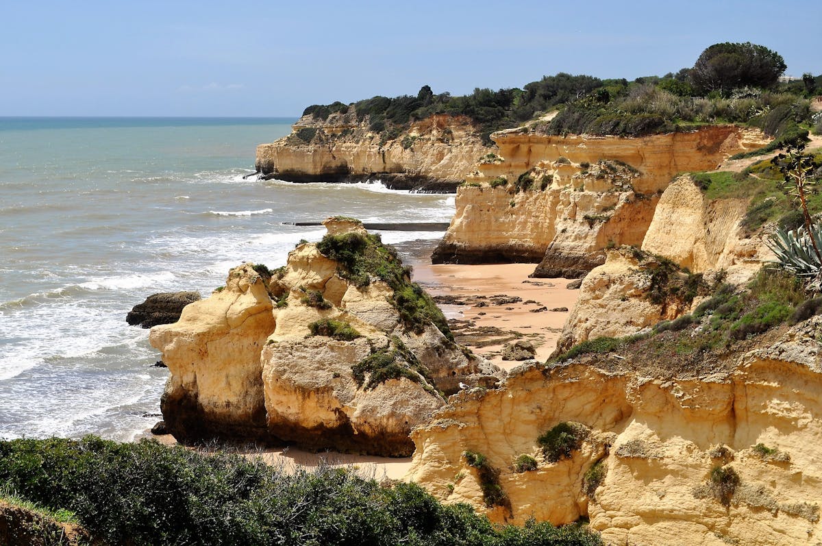Spectacular eroded limestone cliffs along the Algarve coast in southern Portugal