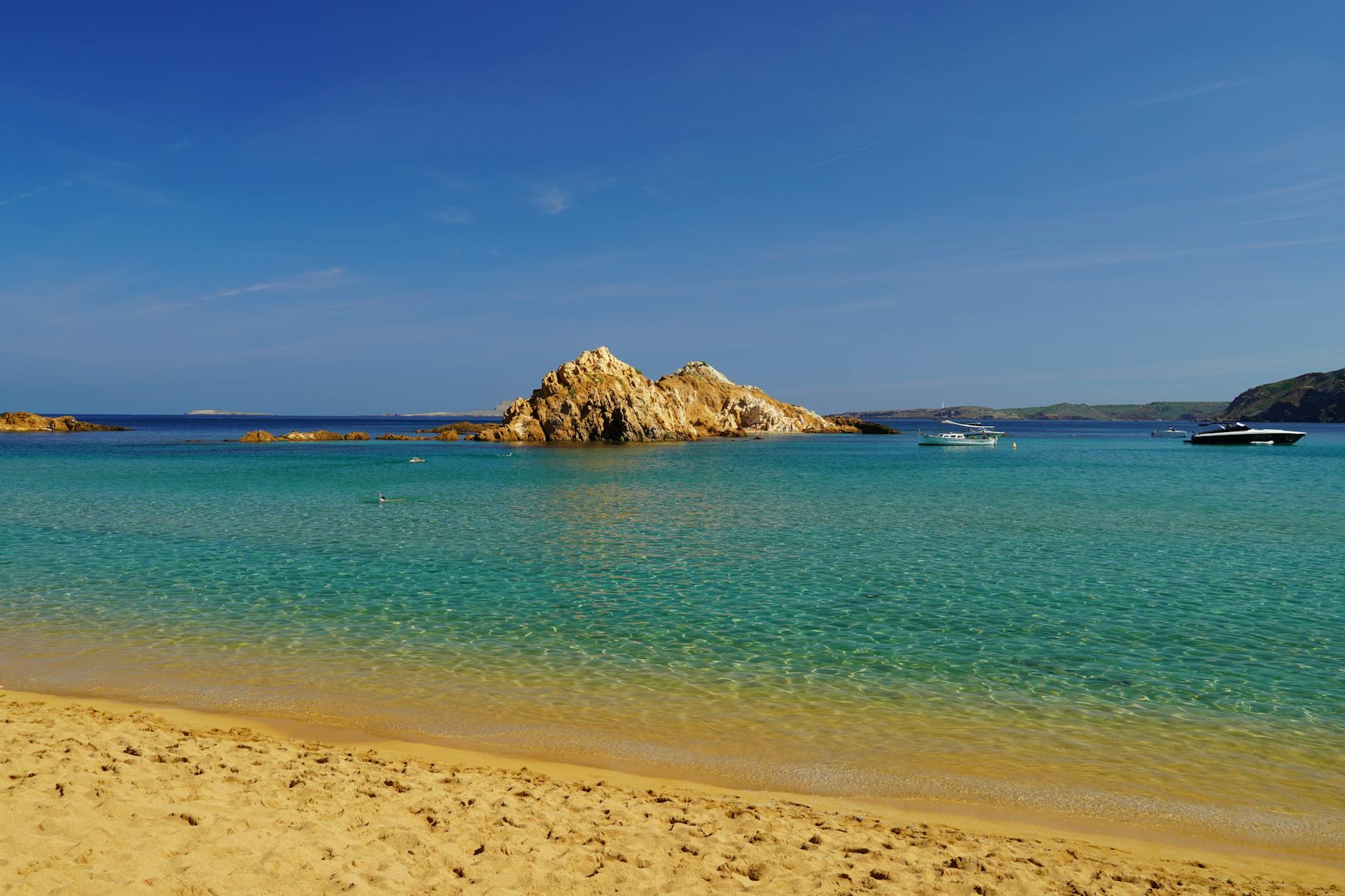 Crystal clear turquoise water and golden sand at a beach near the Cies Islands, Galicia, Spain