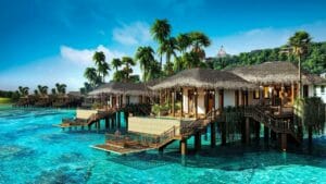 huts near body of water