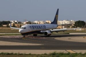 Ryanair Boeing 737 taxiing on runway at Malta airport on a sunny day