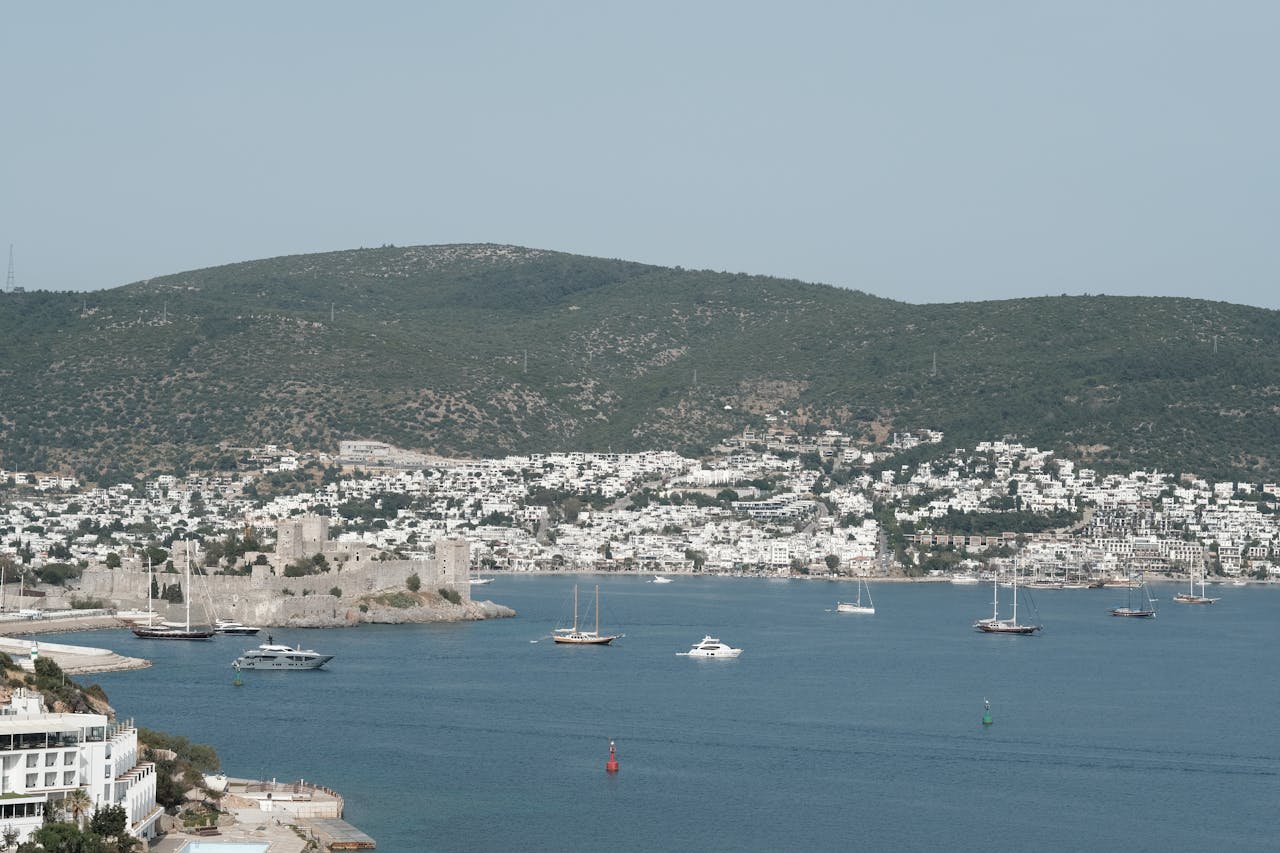 Coastal view of Bodrum, Turkey, showing the medieval castle and blue bay in summer