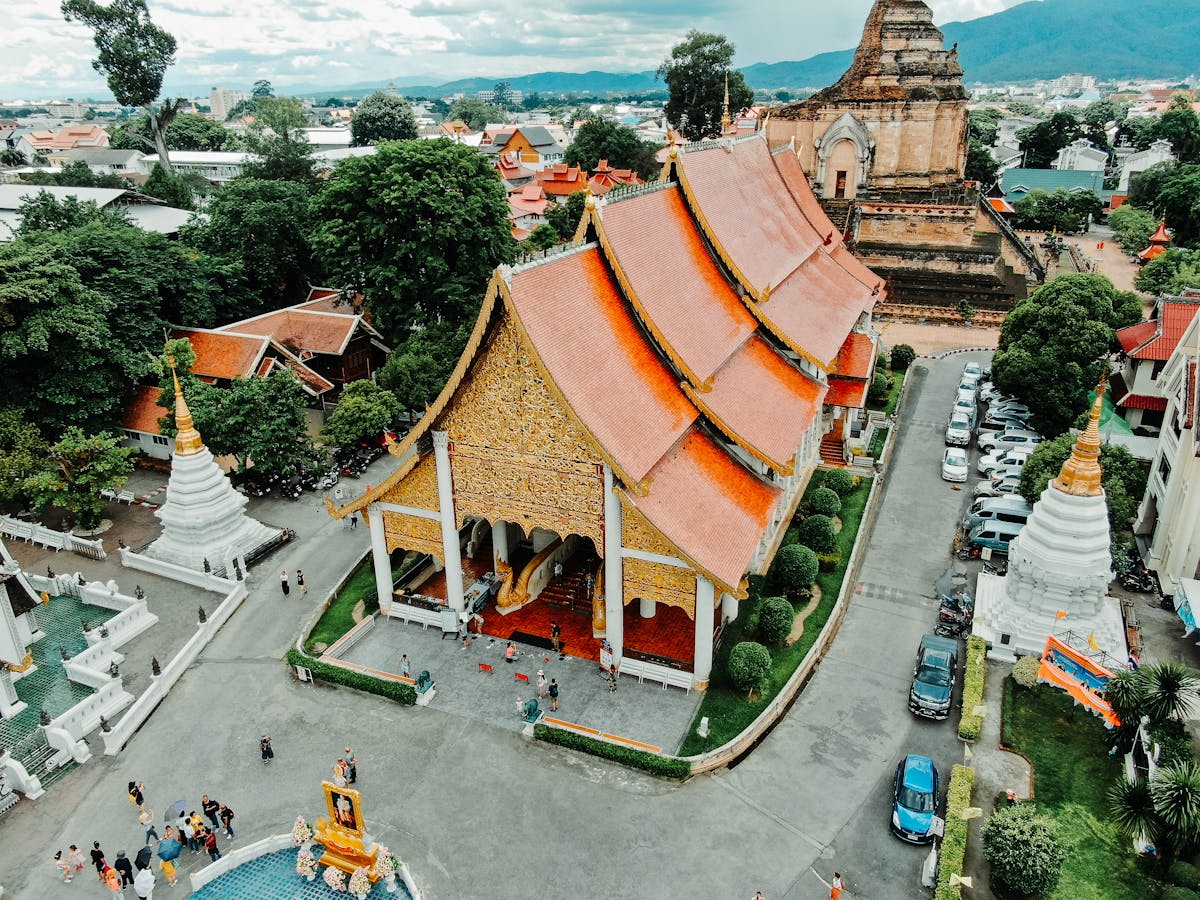 Architectural aerial view of the orange temple of Wat Chedi Luang in Chiang Mai, Thailand
