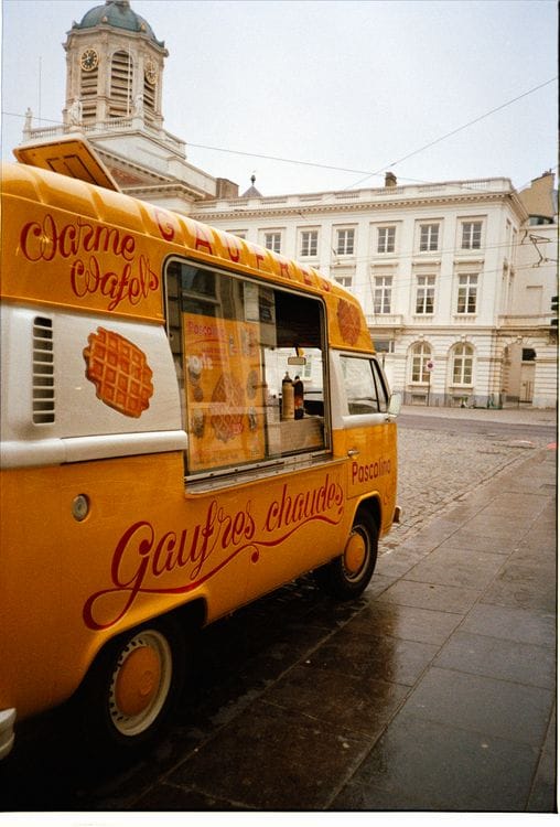 A street food van selling Belgian waffles on a Brussels street