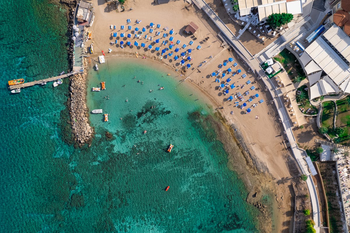 A turquoise sandy cove on the Cyprus coast seen from above