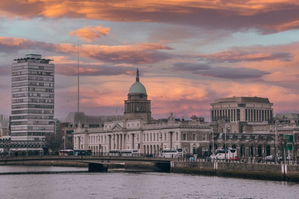 Dublin Custom House reflected in the River Liffey at sunset