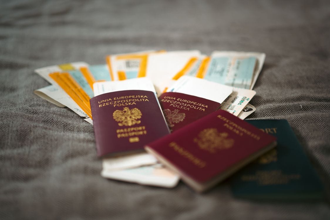 Is TUI travel insurance worth it — travel insurance documents and passport laid out before a trip