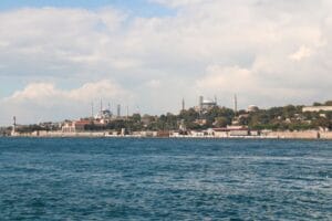 Panoramic view of Istanbul skyline from the Bosphorus showing Blue Mosque and Hagia Sophia