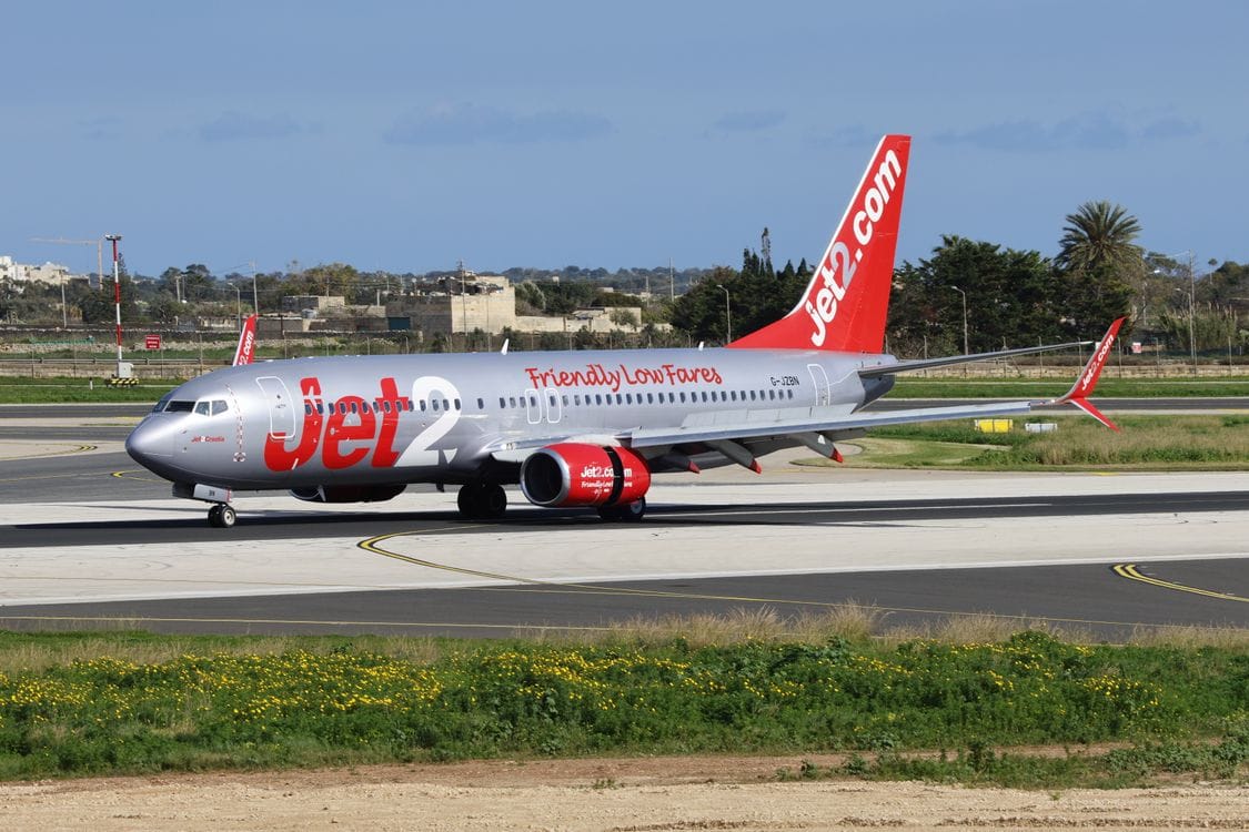Jet2 aircraft on airport tarmac showing Jet2 Friendly Low Fares livery