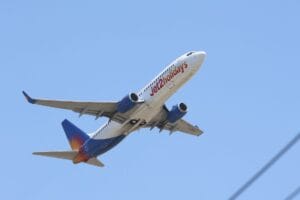 Jet2holidays Boeing 737 in flight against a clear blue sky