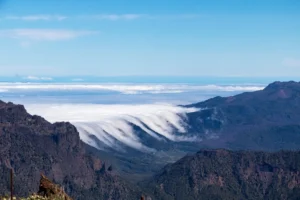 La Palma mountain scenery with green peaks and rolling clouds, Canary Islands