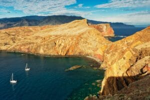 aerial photography of mountains near ocean