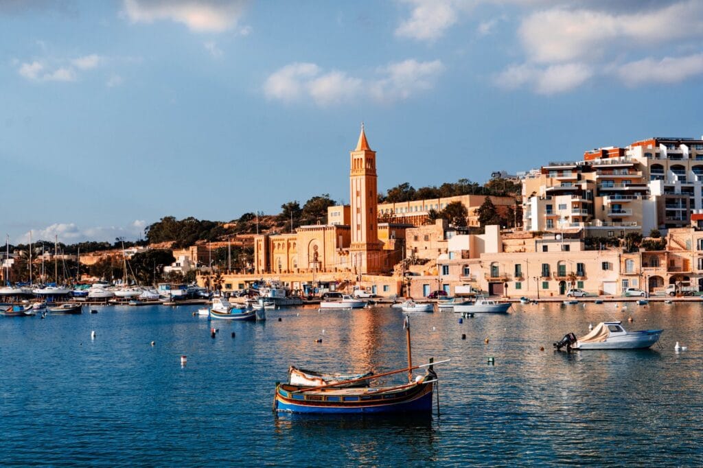 antique buildings in harbor on malta