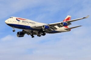 British Airways Boeing 747 aircraft in flight against a clear blue sky — when does BA release flights