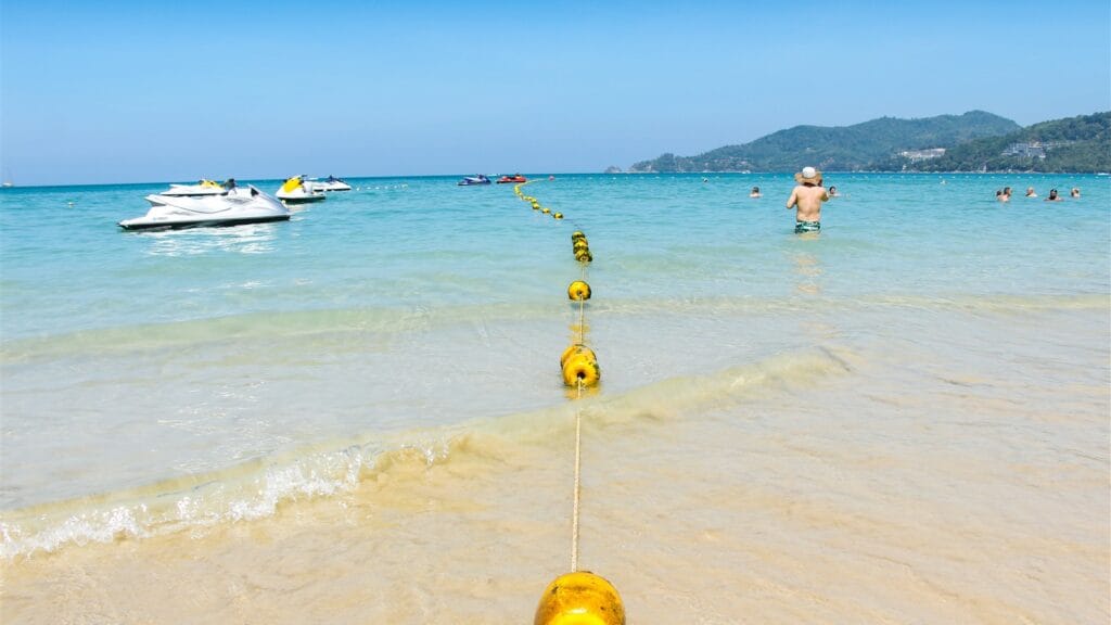 Bright Phuket beach with clear water for Norse Gatwick to Phuket flights
