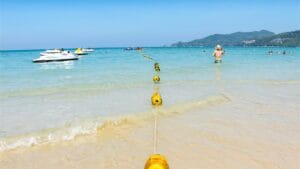 Bright Phuket beach with clear water for Norse Gatwick to Phuket flights