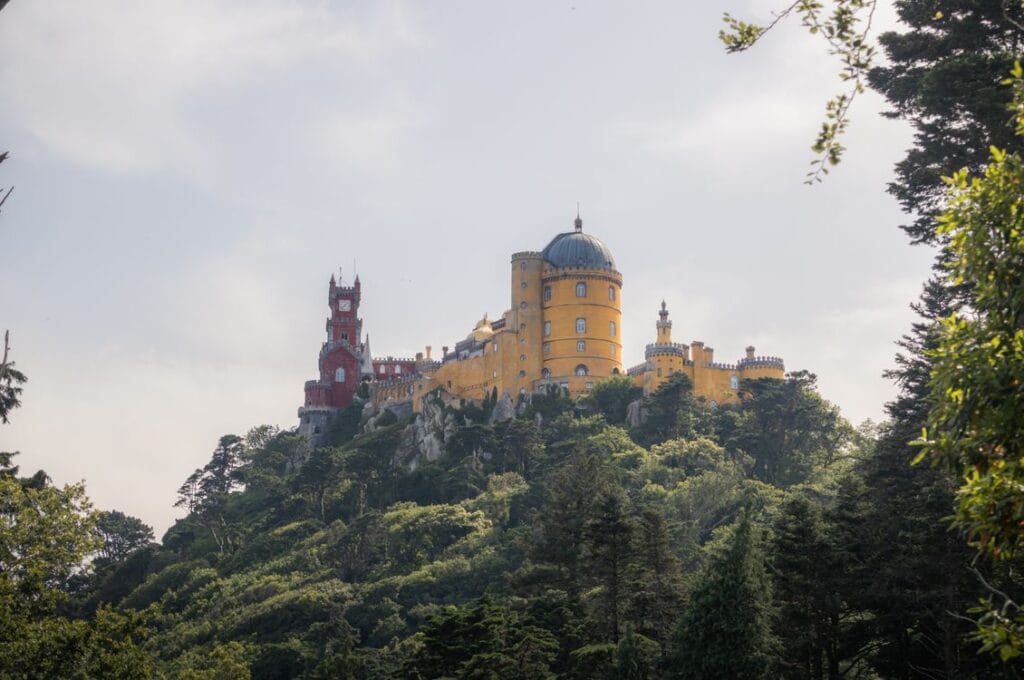 Pena Palace in Sintra, Portugal, surrounded by lush green forest