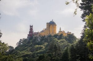 Pena Palace in Sintra, Portugal, surrounded by lush green forest