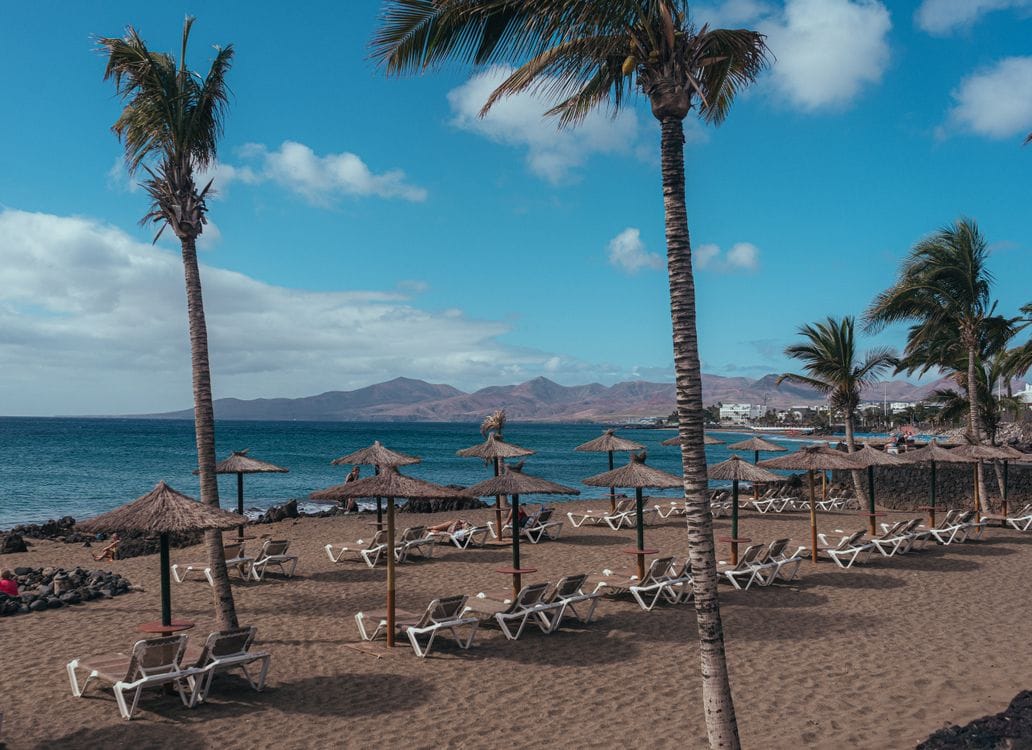Puerto del Carmen beach, Lanzarote, the island's most popular resort for budget package holidays