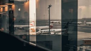 Passenger aircraft parked at an airport terminal for a cheap flight sale