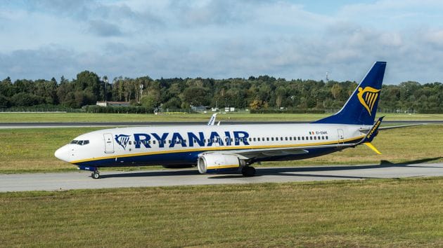 Ryanair airplane on the runway at Hamburg Airport on a clear day