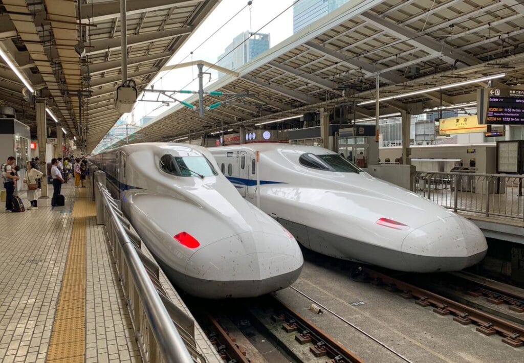 japan rail pass worth it — two shinkansen bullet trains at Tokyo Station, Japan