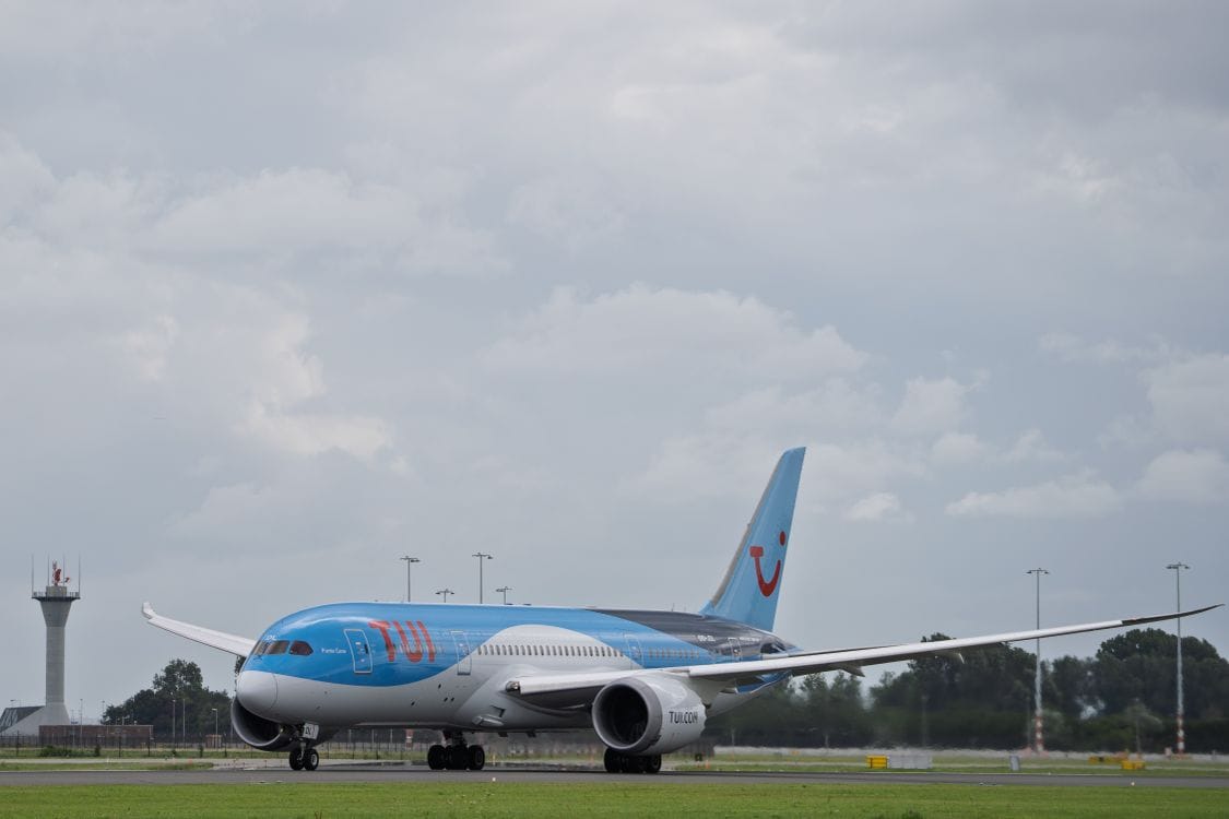 TUI Boeing 787 Dreamliner preparing for takeoff on a cloudy day at the airport