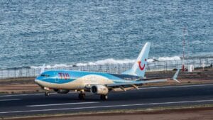 flying with tui — TUI aircraft at a UK airport ready for departure