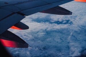 Aer Lingus sale dates: aircraft wing over clouds at twilight