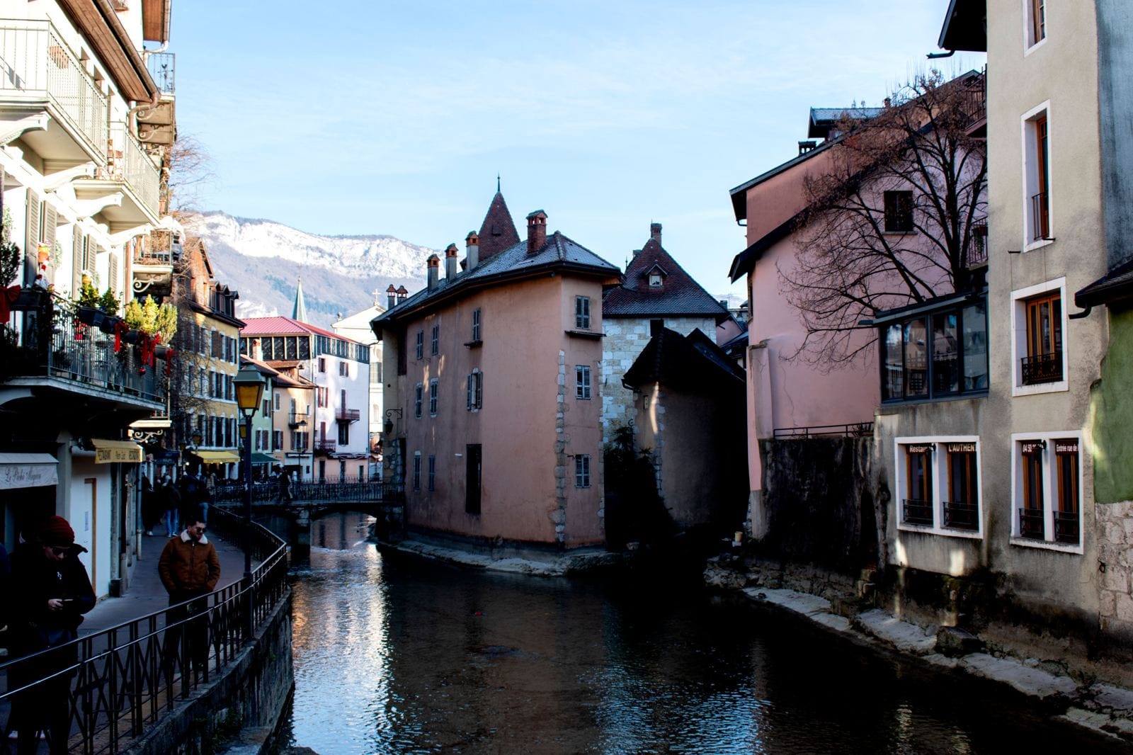 Annecy canal and old town buildings in winter