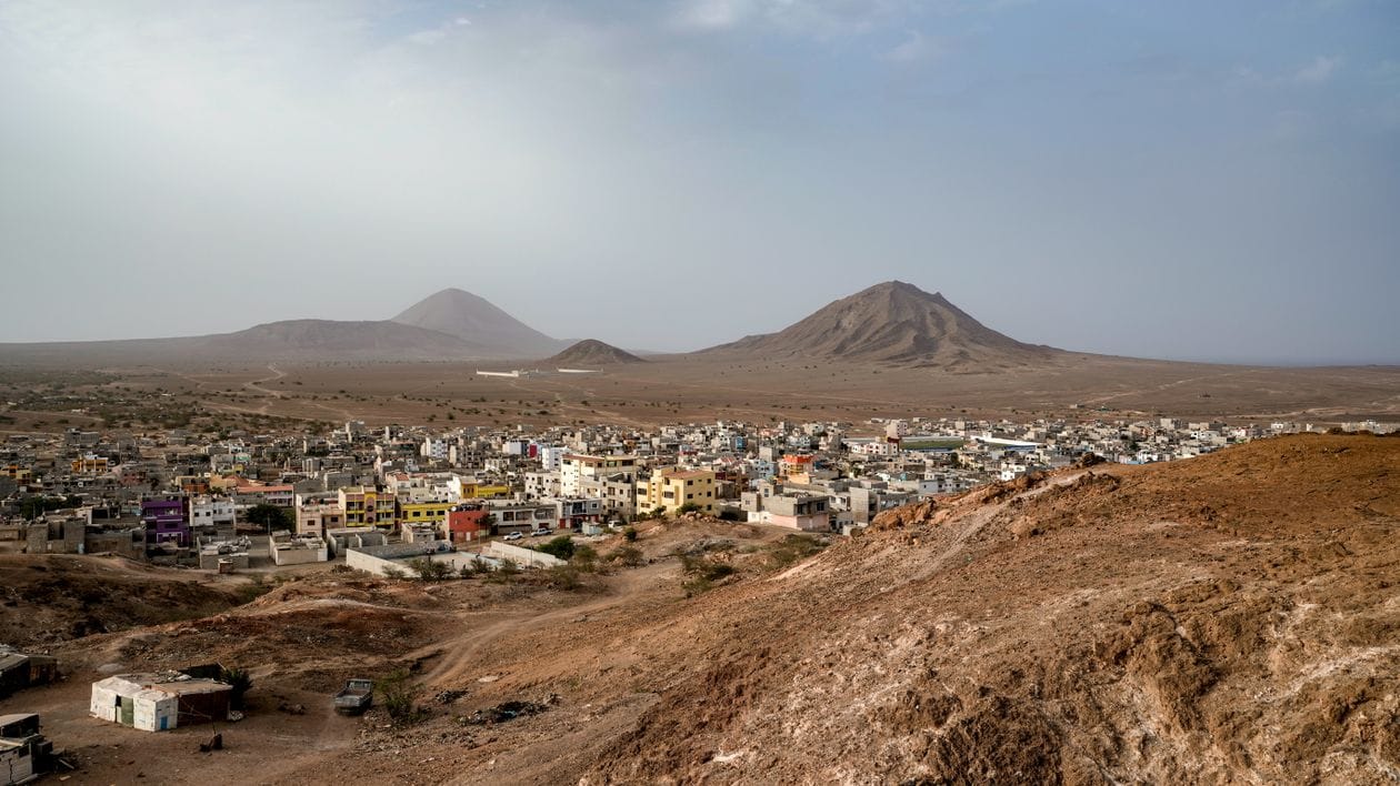 A small colourful town beneath volcanic hills on a Cape Verde island