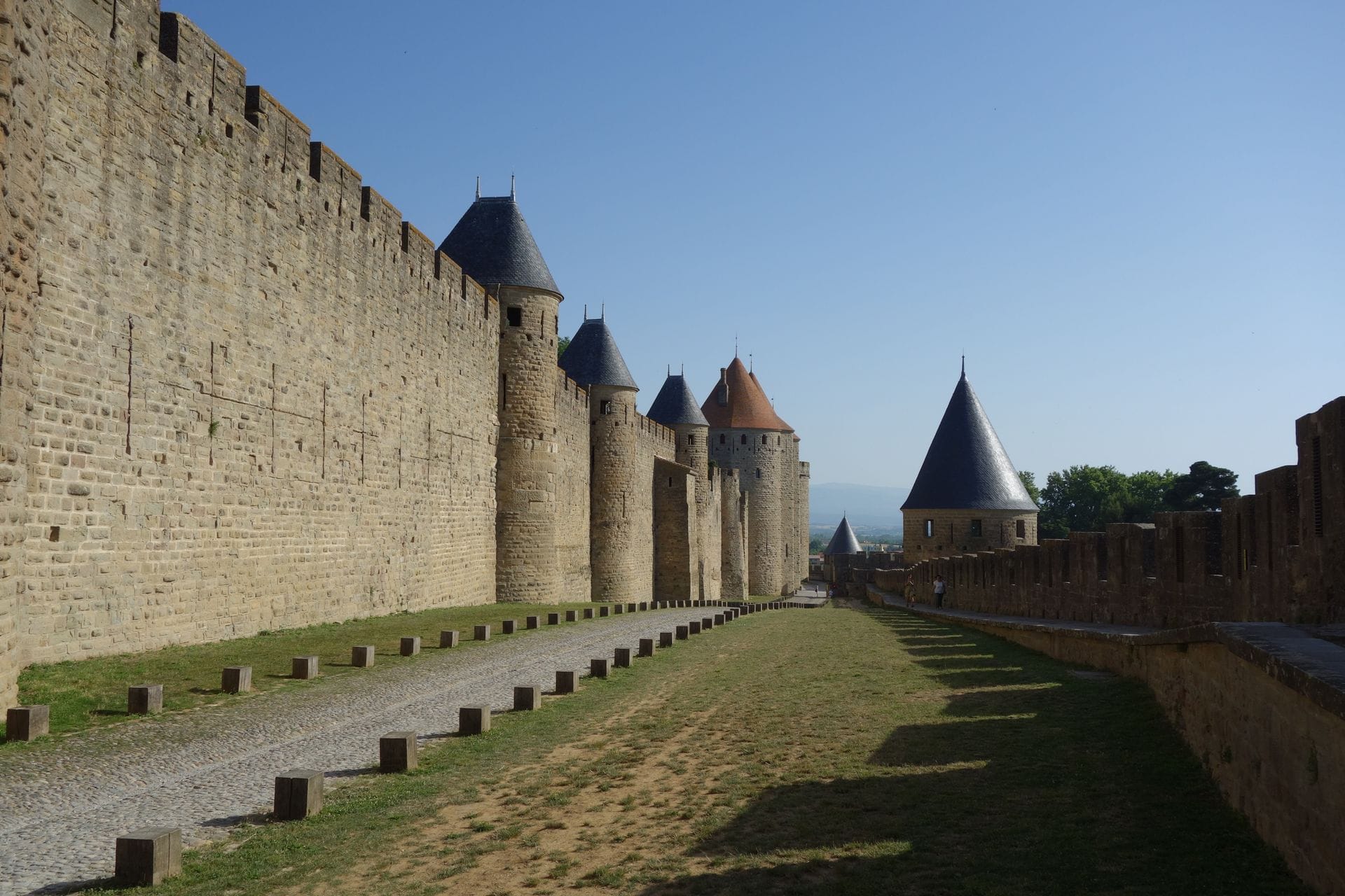 The fortified stone walls and towers of Carcassonne's medieval Cite