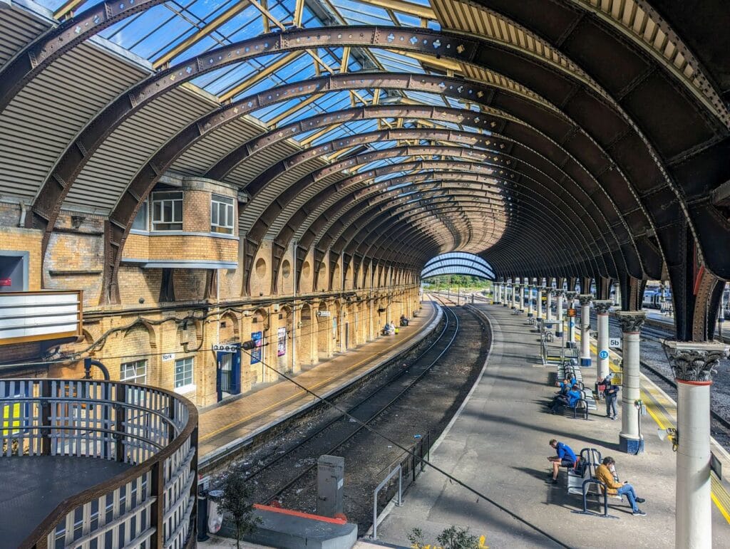 Carnforth holidays begin under dramatic Victorian glass and ironwork like this historic station roof
