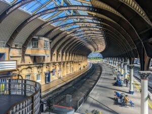 Carnforth holidays begin under dramatic Victorian glass and ironwork like this historic station roof