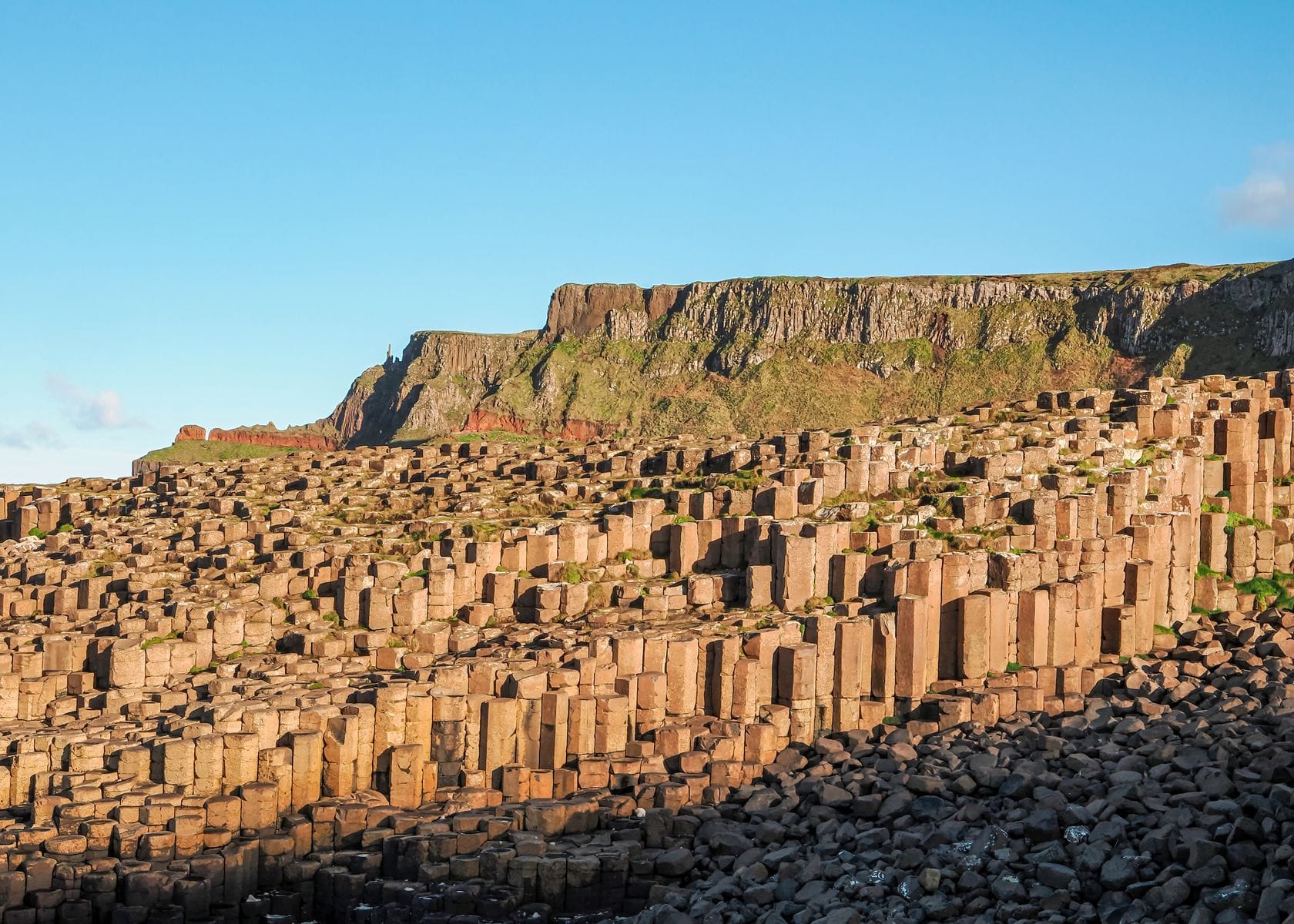 Giant's Causeway holiday guide - basalt columns at sunset, Northern Ireland